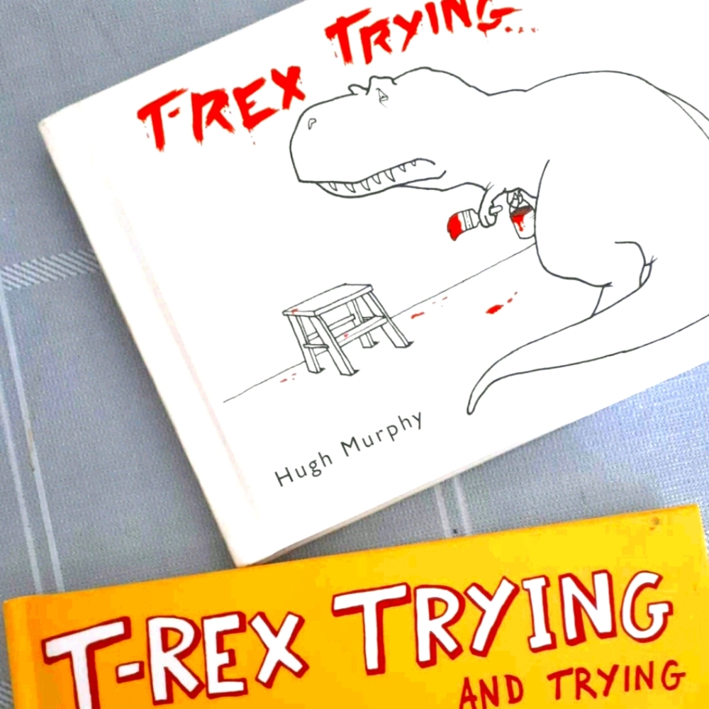 2 hard covered books: T-Rex comic